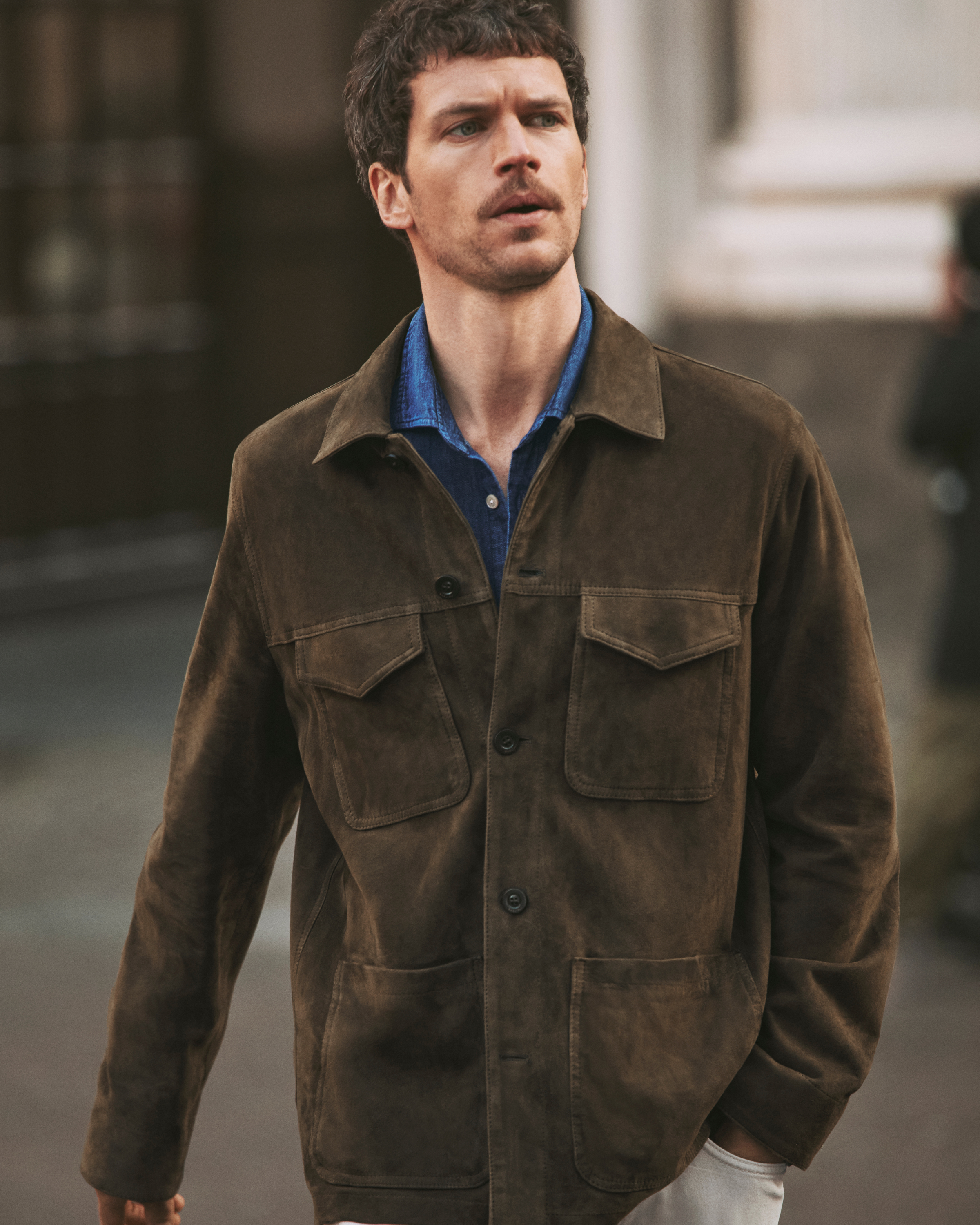 person in brown suit